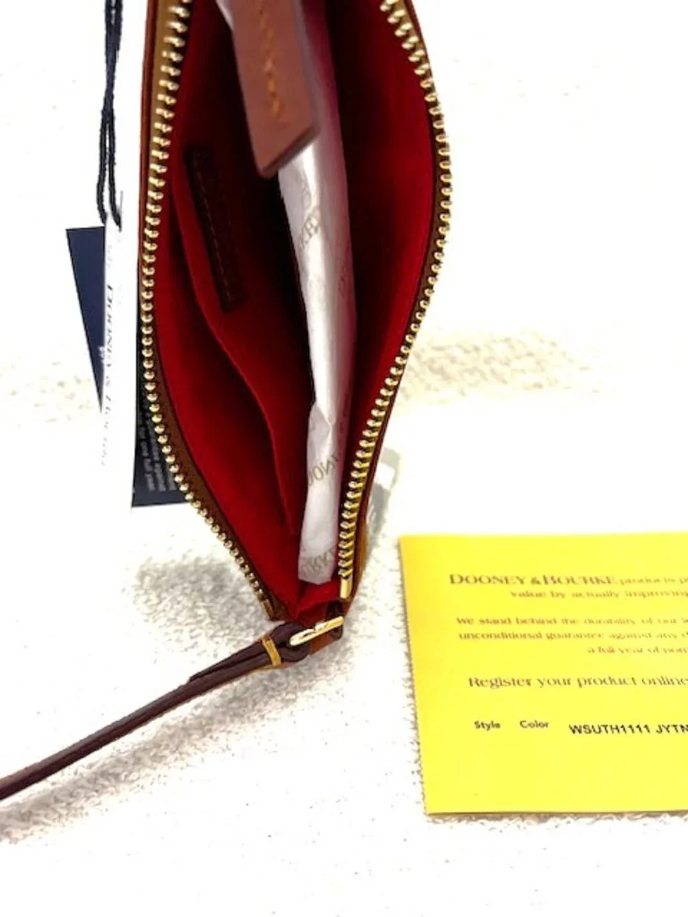 Dooney & Bourke large slim wristlet in Light Gray plaid NWT